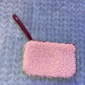 cute ipsy fluff bag